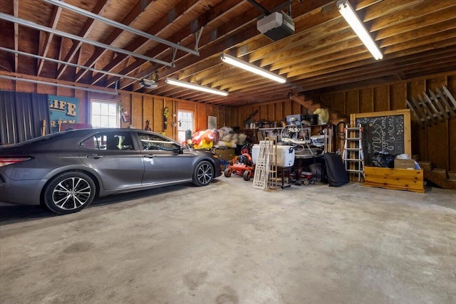 garage featuring a garage door opener