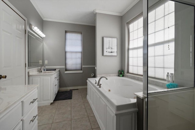 full bath featuring crown molding, two vanities, tile patterned floors, a tub with jets, and a sink