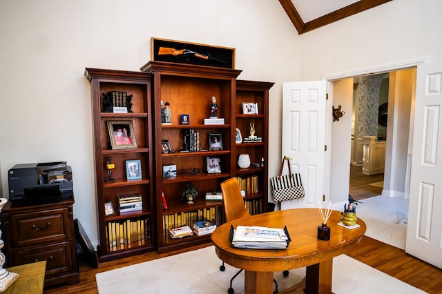 office area with wood finished floors and baseboards