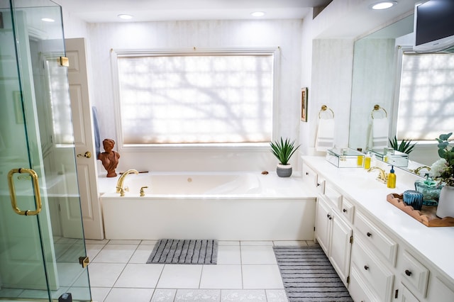 full bathroom featuring a garden tub, recessed lighting, a stall shower, tile patterned floors, and vanity