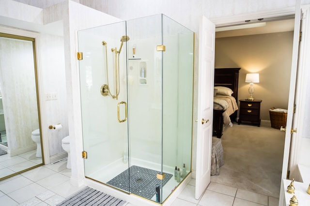 bathroom with ensuite bath, a shower stall, tile patterned floors, and toilet