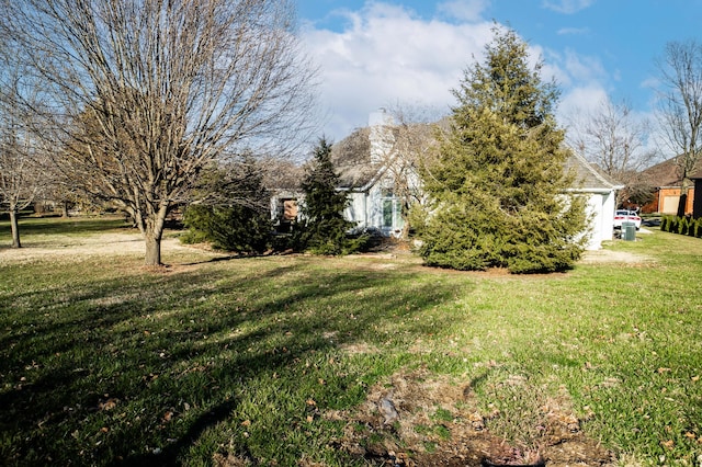 view of yard with a garage