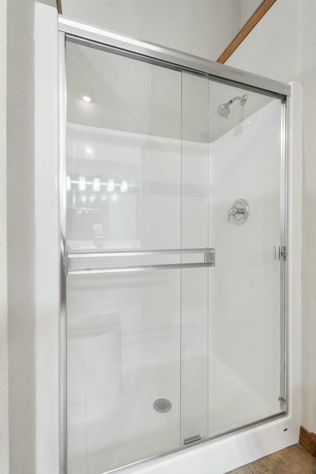 bathroom with a stall shower