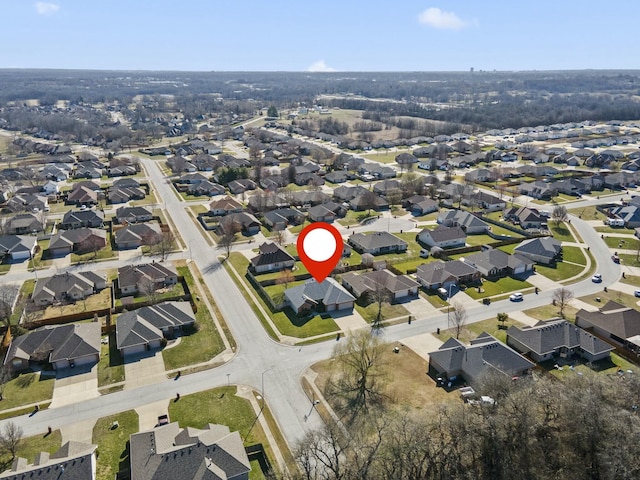 birds eye view of property with a residential view