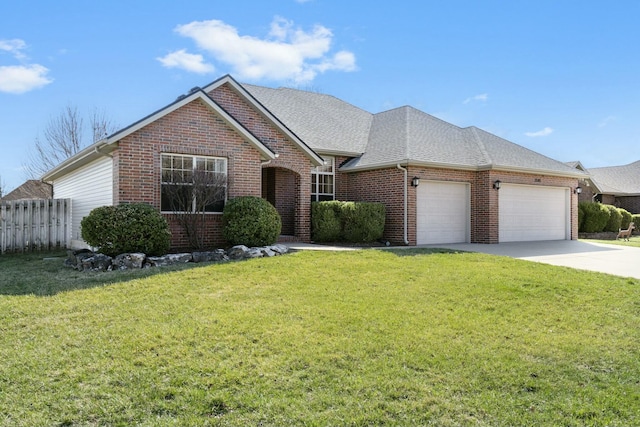 single story home featuring brick siding, driveway, a front yard, and a garage