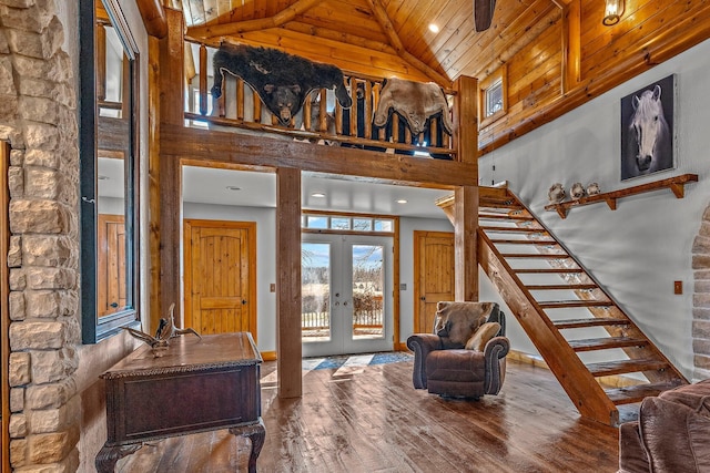 entrance foyer with stairway, wood ceiling, french doors, hardwood / wood-style flooring, and high vaulted ceiling