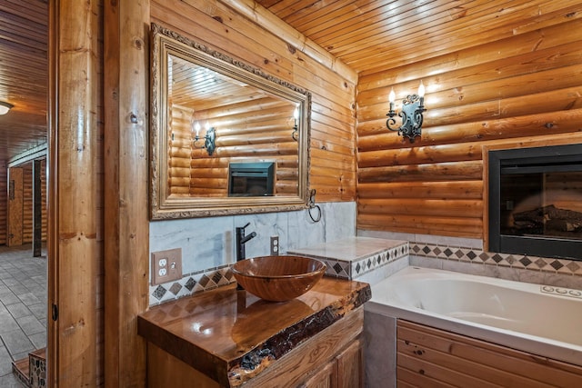 bathroom featuring rustic walls, wood ceiling, a bath, and vanity