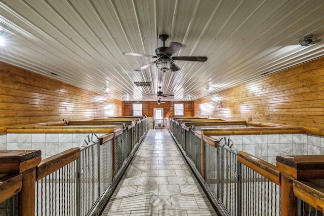 interior space featuring a ceiling fan