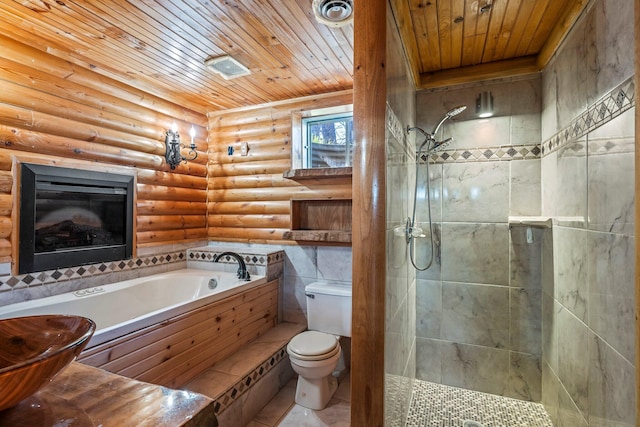 bathroom featuring wood ceiling, a shower stall, toilet, and a garden tub