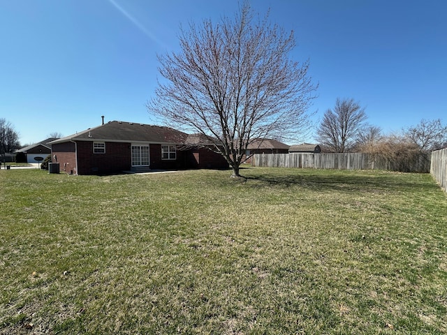 view of yard featuring fence