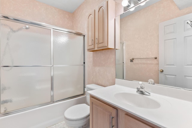 full bath featuring vanity, toilet, and enclosed tub / shower combo