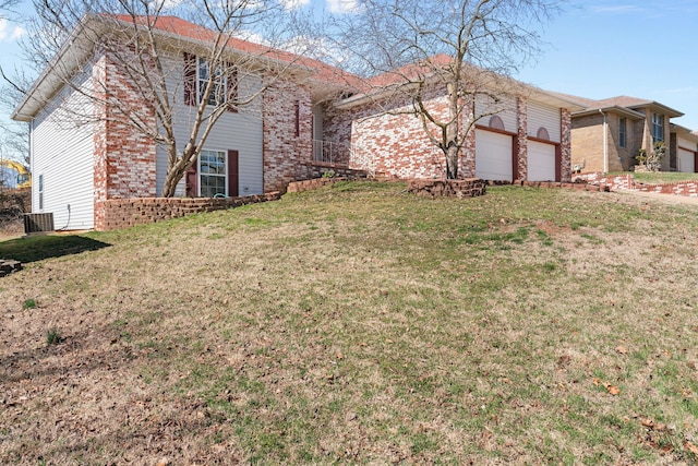 view of home's exterior featuring a yard, brick siding, and an attached garage