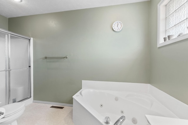 bathroom with visible vents, a whirlpool tub, a shower stall, a textured ceiling, and toilet