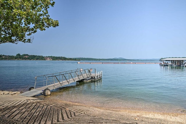 view of dock with a water view