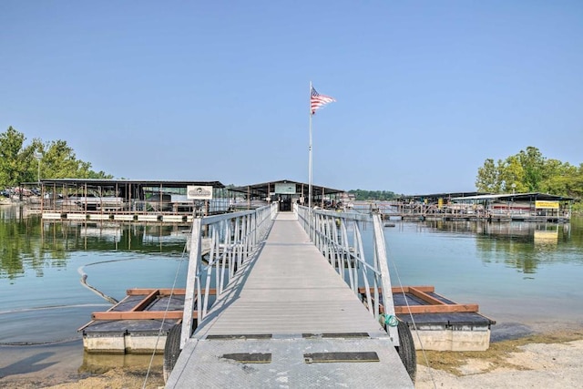 dock area featuring a water view