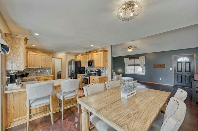 dining area featuring ceiling fan, baseboards, dark wood-style floors, and recessed lighting