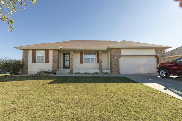 single story home with concrete driveway, an attached garage, a front lawn, and roof with shingles