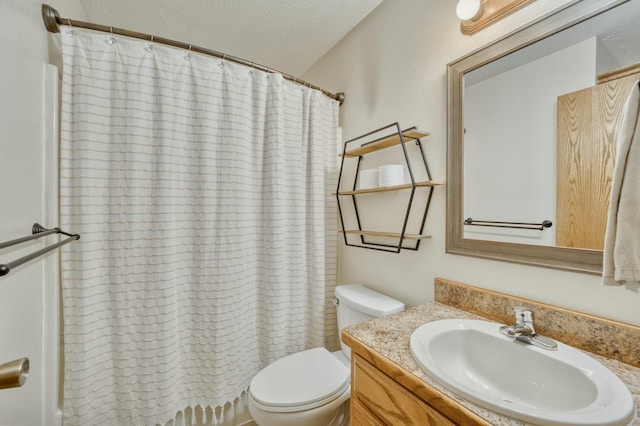 full bath featuring vanity, curtained shower, and toilet