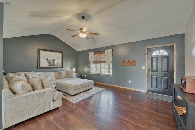 living area featuring lofted ceiling, wood finished floors, baseboards, and ceiling fan