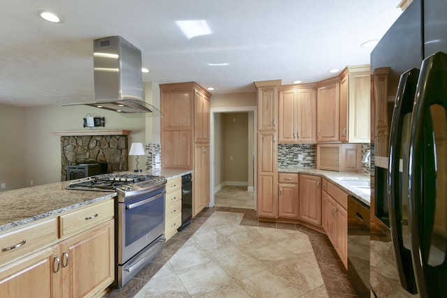 kitchen featuring black appliances, light stone countertops, island exhaust hood, and backsplash