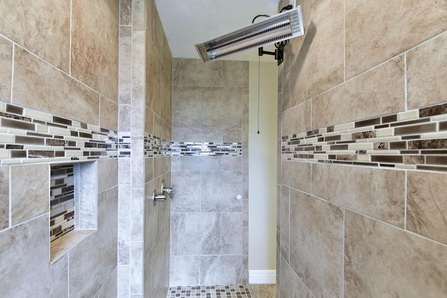 bathroom featuring tiled shower