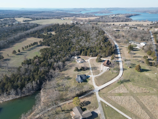 bird's eye view with a water view and a rural view