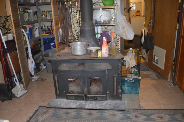 interior details featuring visible vents and a wood stove