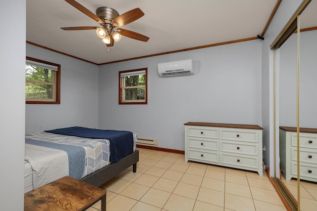 bedroom featuring ornamental molding, a baseboard heating unit, a wall unit AC, a closet, and light tile patterned floors