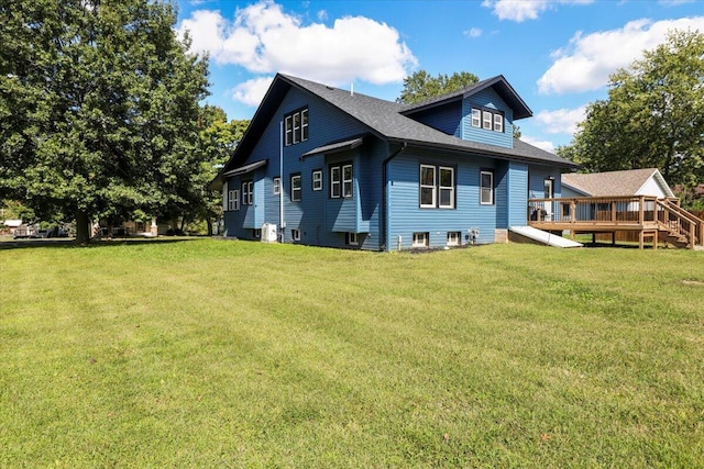 exterior space featuring a deck and a yard