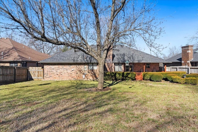 view of yard with fence