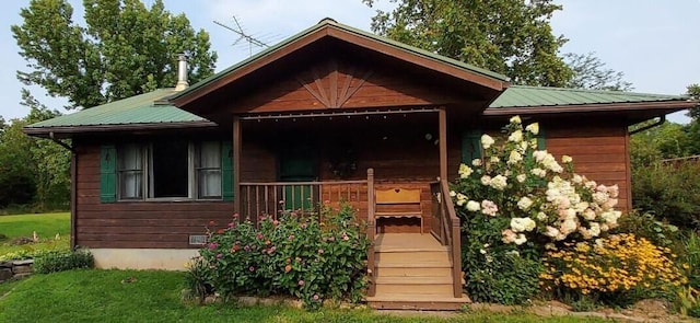 view of front of house with metal roof