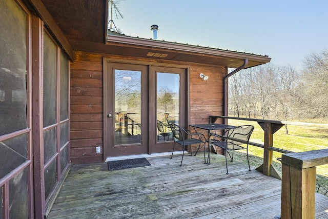 wooden terrace featuring french doors