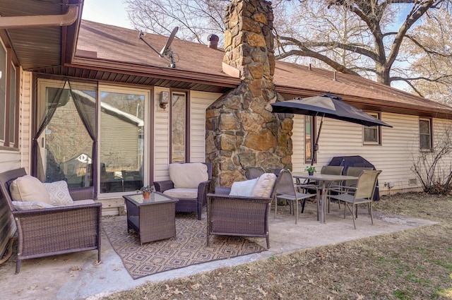 view of patio with outdoor dining area and an outdoor hangout area