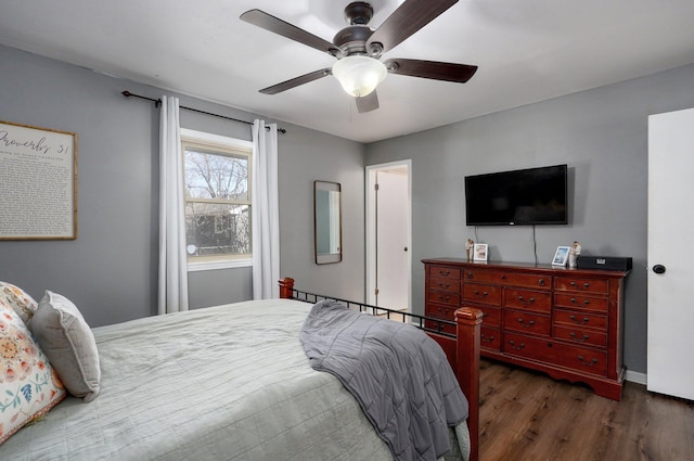 bedroom featuring a ceiling fan and wood finished floors