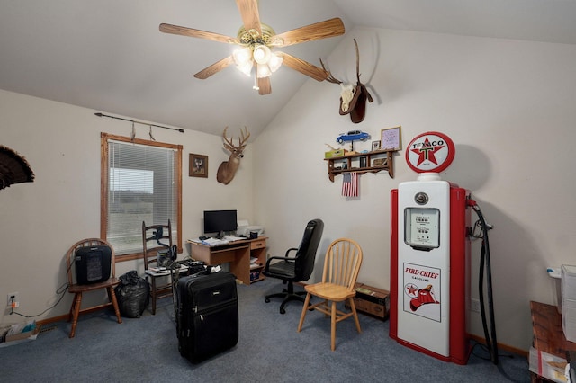 home office featuring lofted ceiling, carpet flooring, baseboards, and ceiling fan