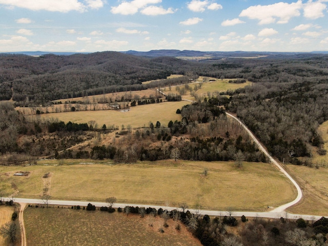 aerial view featuring a rural view and a mountain view