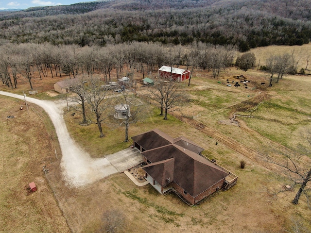 bird's eye view featuring a rural view and a forest view