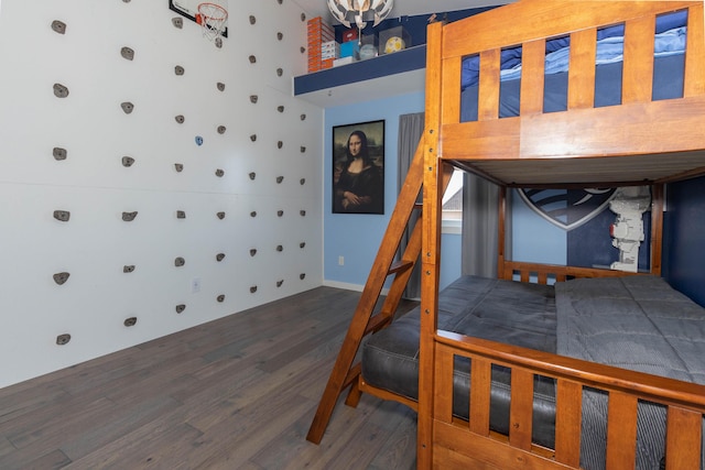 bedroom with wood finished floors