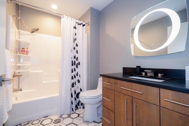 bathroom with vanity, toilet, and shower / bath combo