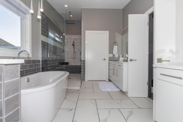 bathroom featuring vanity, tiled shower, recessed lighting, a freestanding bath, and marble finish floor