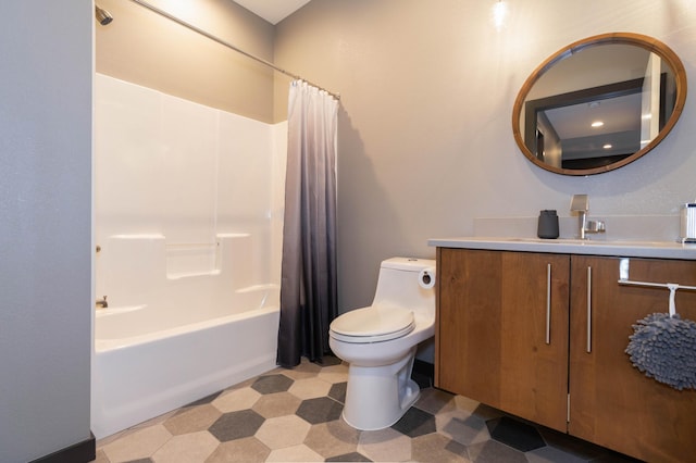 bathroom featuring vanity, shower / tub combo, and toilet