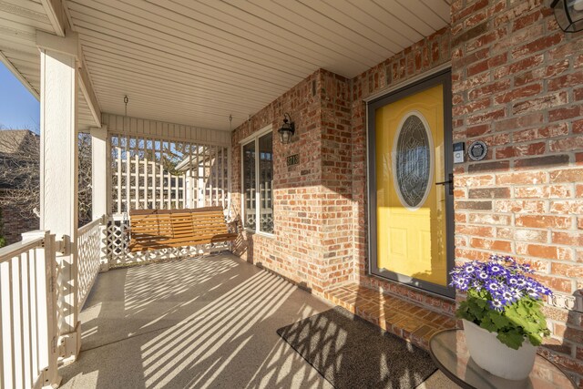 view of patio featuring a porch