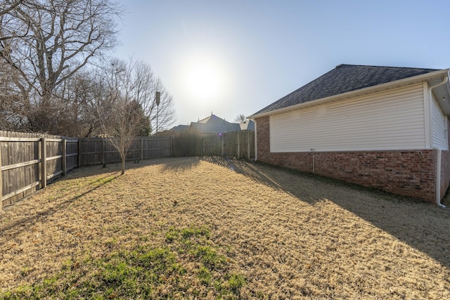 view of yard featuring a fenced backyard