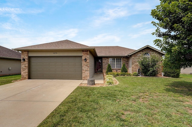 single story home with a front lawn, roof with shingles, concrete driveway, a garage, and brick siding