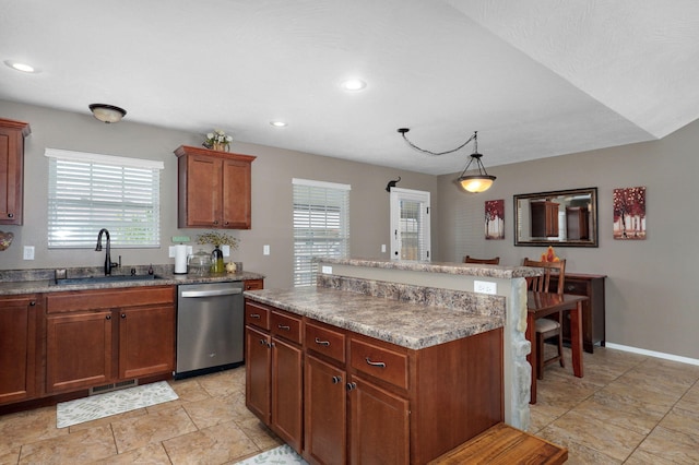 kitchen with a sink, a kitchen island, stainless steel dishwasher, and a healthy amount of sunlight