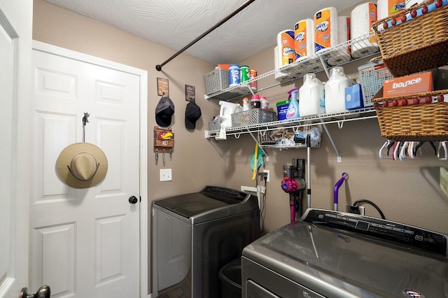 laundry area with washing machine and dryer and laundry area