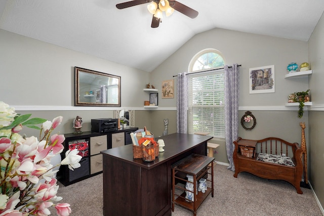 home office with ceiling fan, vaulted ceiling, and light carpet