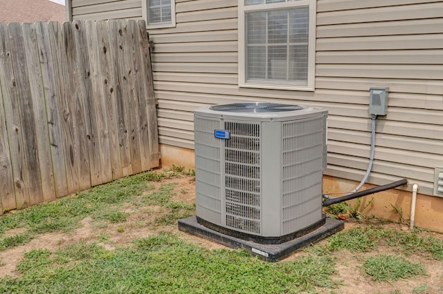 details with central AC and fence