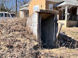 view of entry to storm shelter