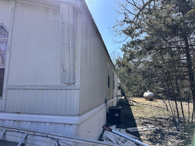 view of home's exterior with central air condition unit